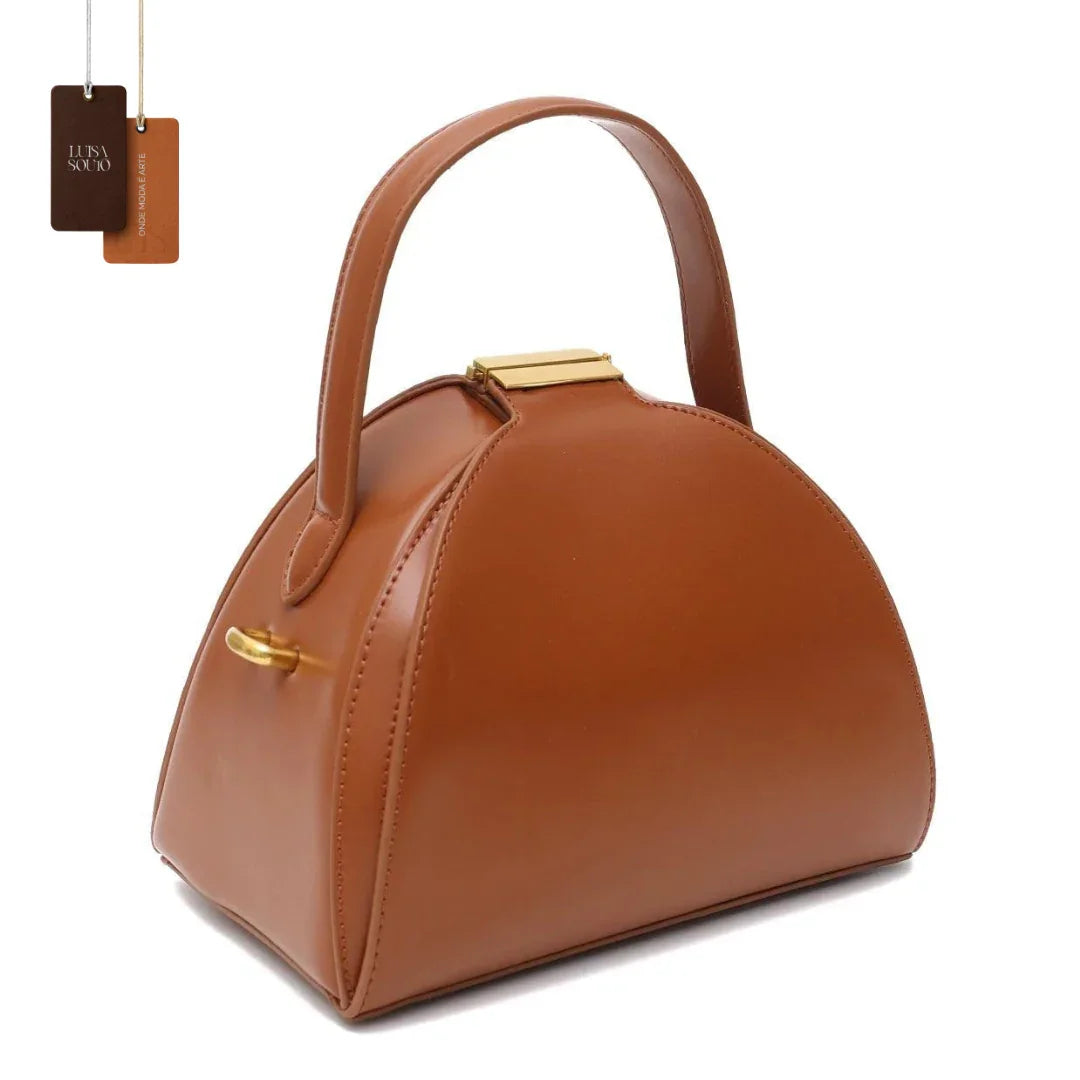 Bolsa de Couro Victoria – Design Estruturado e couro premium.